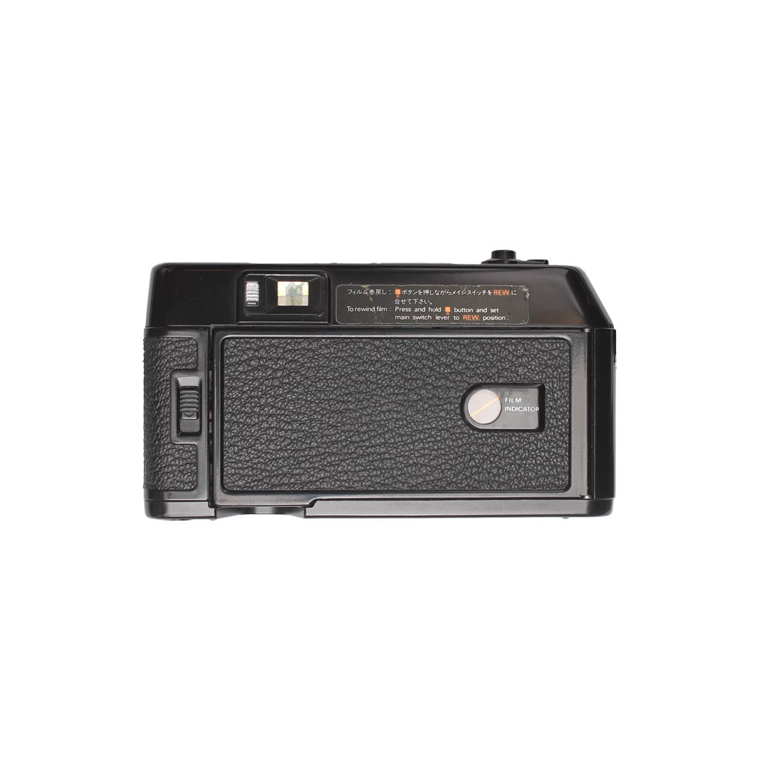 Konica C35 MF - grainoverpixel