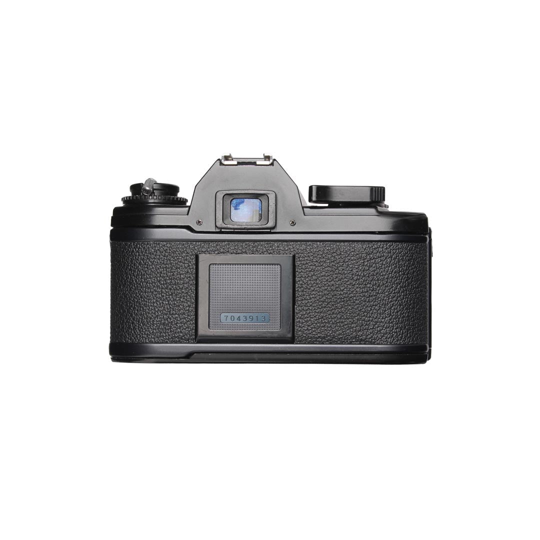 Nikon EM + 50mm f1.8 - grainoverpixel
