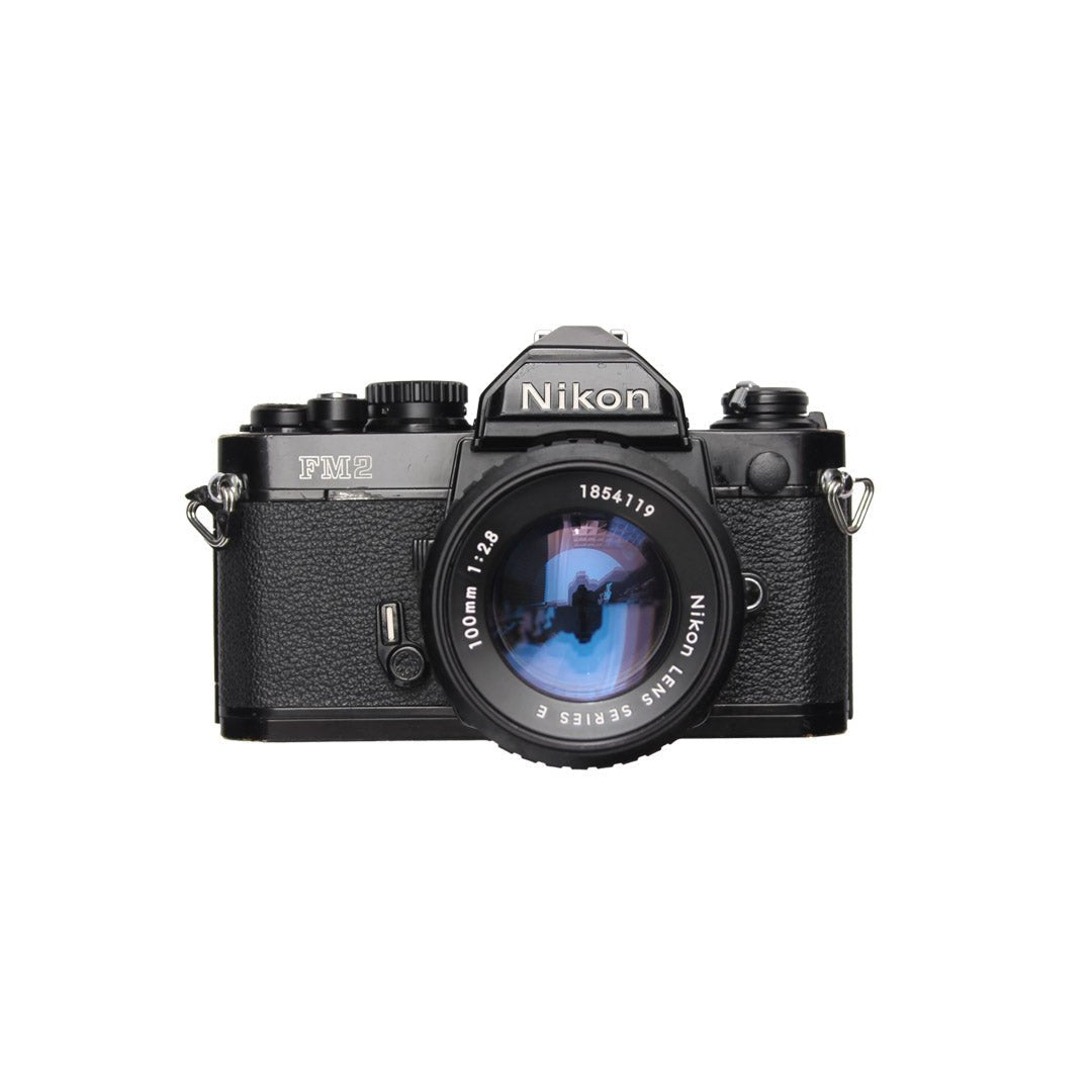 Nikon FM2 + 100mm f2.8 - grainoverpixel
